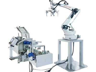 نظام أوتوماتيكي لتغذية ونقل صفائح العلبة المعدنية