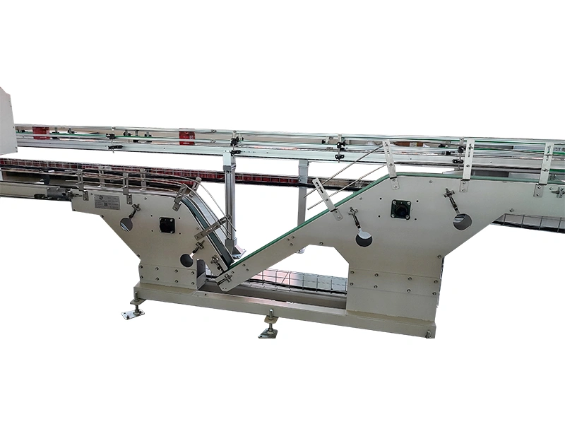 آلة تسوية أجسام العلب (تحويلها إلى الوضع العمودي)